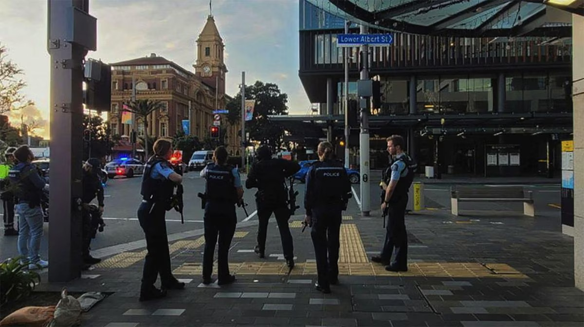 A supplied screenshot taken from TV footage obtained on Thursday, July 20, 2023, of NZ police on the scene in Auckland CBD, New Zealand, following reports of gunfire. Photo: Reuters