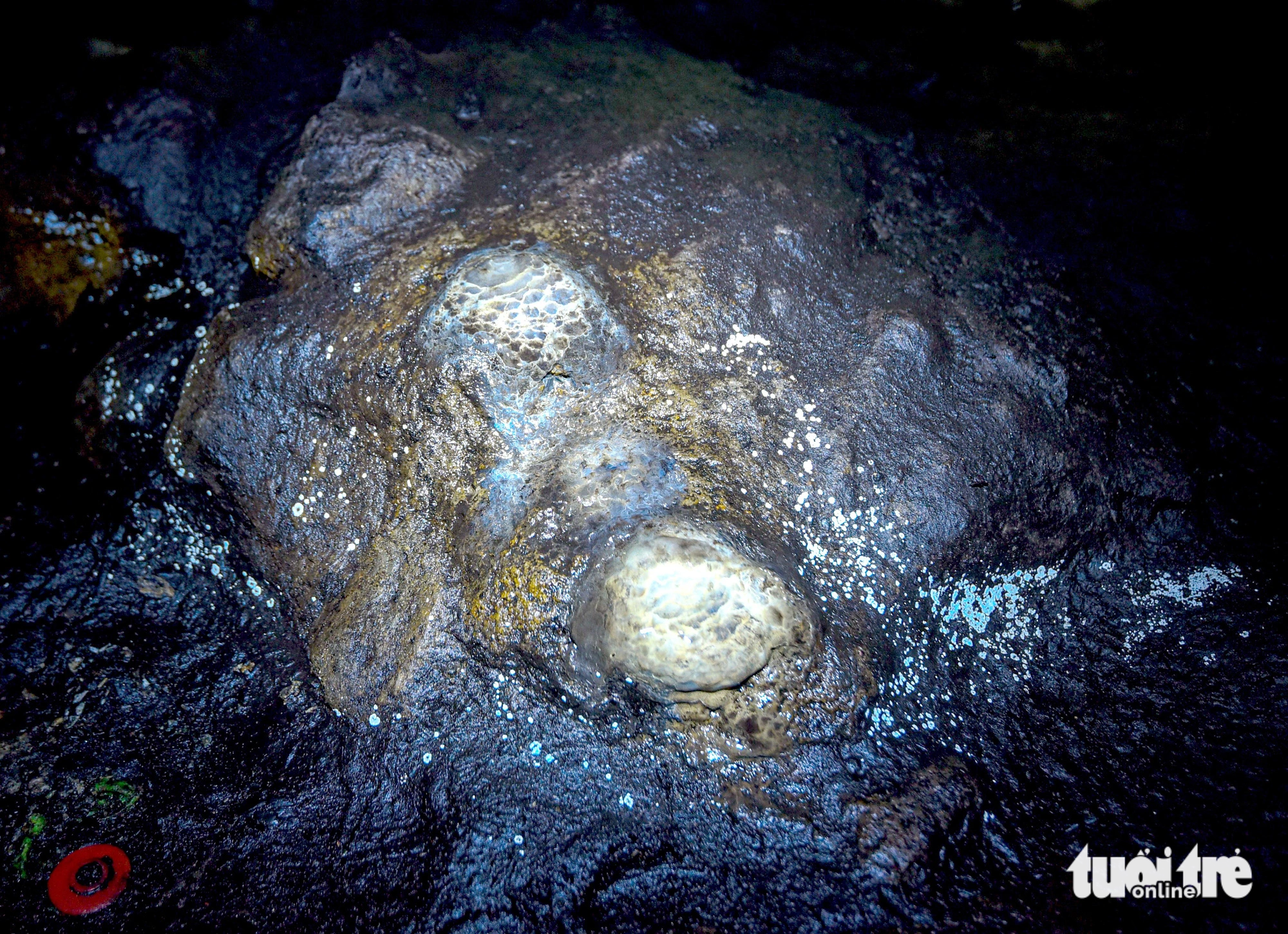 A photo shows features of a typical volcanic eruption such as lava lines and sinkholes. Photo: Tuoi Tre