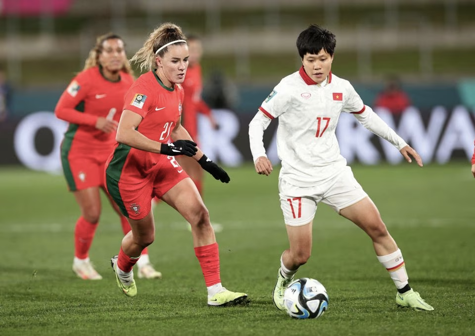 Soccer Football - FIFA Women's World Cup Australia and New Zealand 2023 - Group E - Portugal v Vietnam - Waikato Stadium, Hamilton, New Zealand - July 27, 2023 Vietnam's Tran Thi Thu Thao in action with Portugal's Ana Capeta. Photo: Reuters