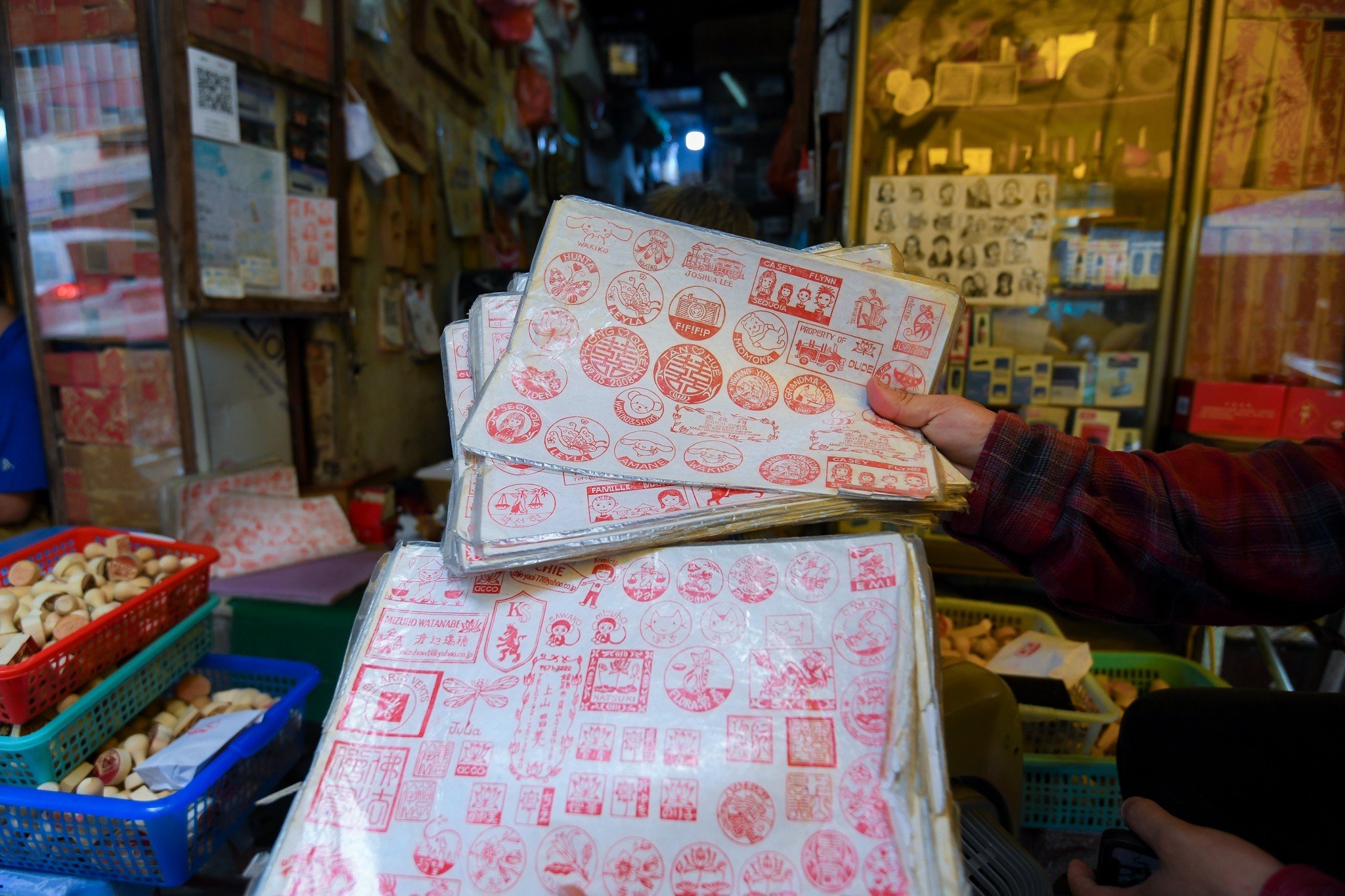 A variety of stamp designs Toan has made for customers. Photo: Nam Tran / Tuoi Tre News