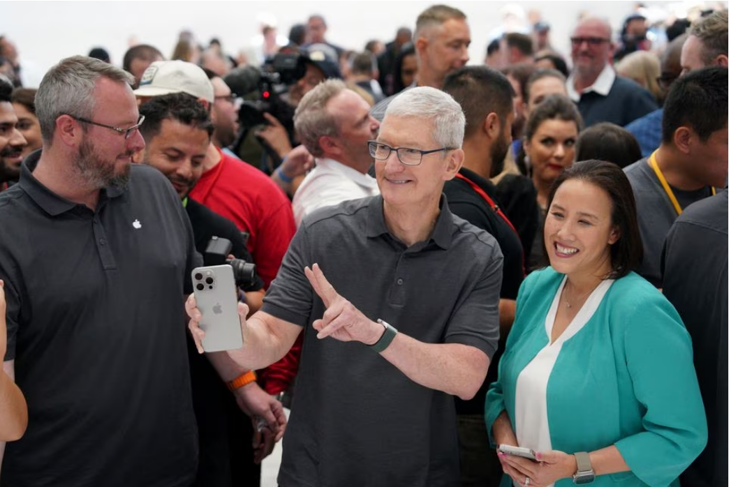 Apple CEO Tim Cook holds a new iPhone 15 Pro during the 'Wonderlust' event at the company's headquarters in Cupertino, California, U.S. September 12, 2023. Photo: Reuters