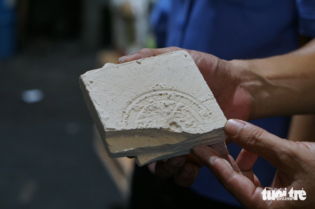 A brick of heroin about to be destroyed. Photo: Tuyet Mai / Tuoi Tre