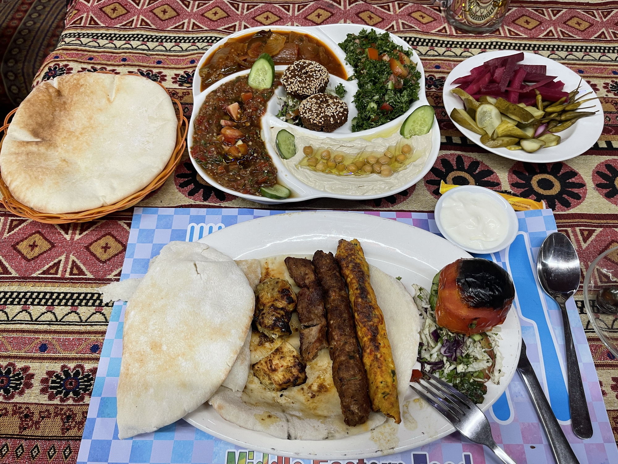Meeze and grilled meat swerved with pitta breads at Al-Sham Saigon. Photo: Dong Nguyen / Tuoi Tre News