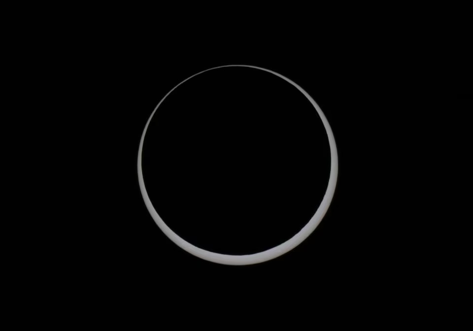 The moon obscures the sun as people gather in Monument Valley to watch the annular solar eclipse in the Navajo Nation, Arizona, October 14. Photo: Reuters
