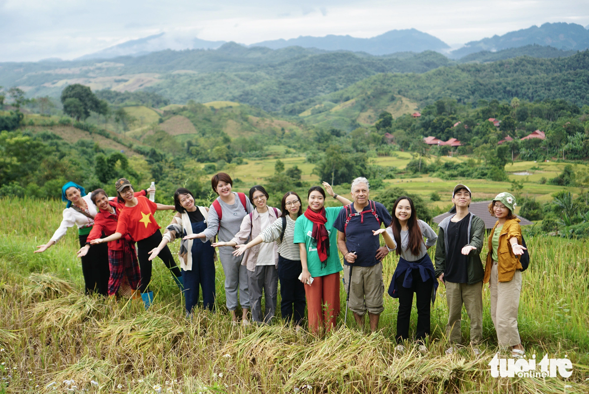 Tourists take photos at a rice terrace field in Na Sang Village, Son La province. Photo: Nguyen Hien / Tuoi Tre