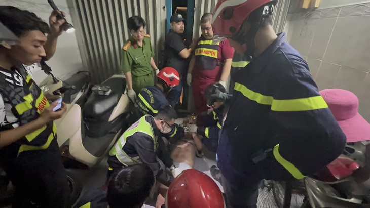 The victim receives first aid before being rushed to a nearby hospital.