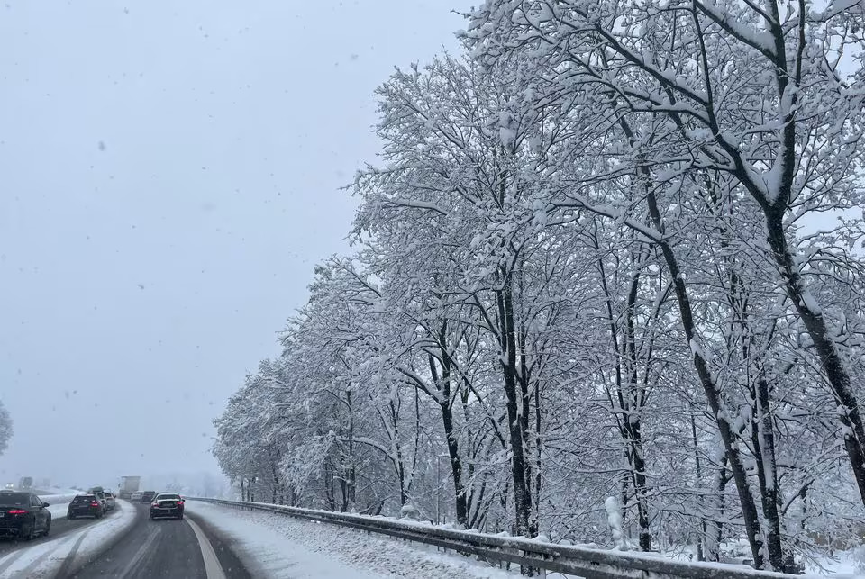 [3/10]Cars make their way on snow covered roads after heavy snowfall hit Bavaria and its capital Munich, Germany, December 2, 2023. The German Bundesliga soccer match FC Bayern Munich v 1. FC Union Berlin had to be cancelled, trains halted and the airport closed because of the weather condition. REUTERS/Louisa Off Acquire Licensing Rights