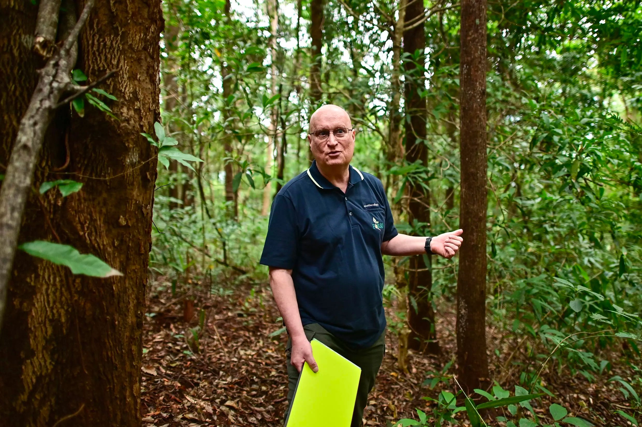 Researcher Stephen Elliott and his team use drone photos to make 3D models that reveal a woodland's health and help estimate how much carbon it can absorb. Photo: AFP