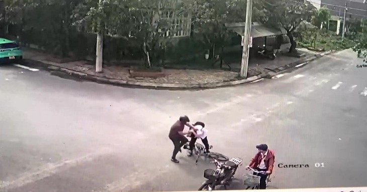 My violently beats Khiem in this screenshot taken from the CCTV footage.