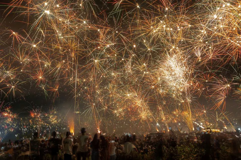 People celebrate New Year's Eve in Palu, Central Sulawesi province, Indonesia, January 1, 2024. Photo: Reuters