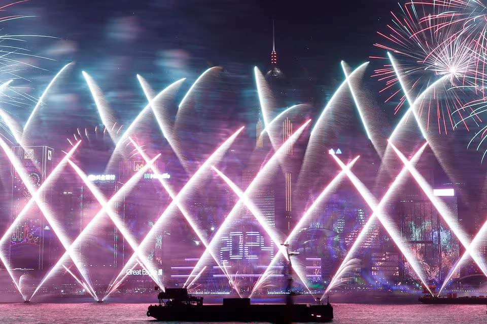 Fireworks explode over Victoria Harbour to celebrate the New Year in Hong Kong. Photo: Reuters