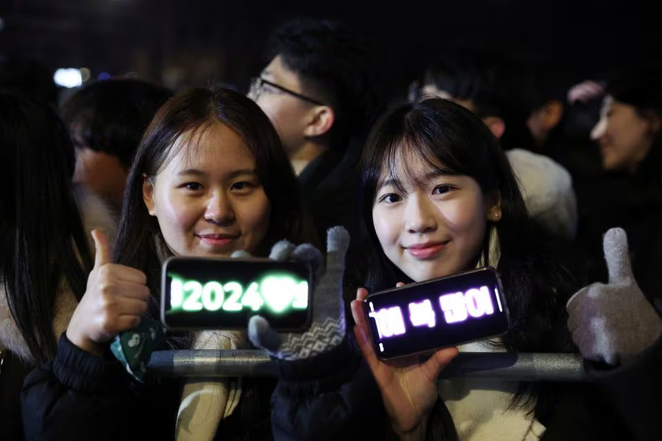 People attend a ceremony to celebrate the new year in Seoul, South Korea, December 31, 2023. Photo: Reuters