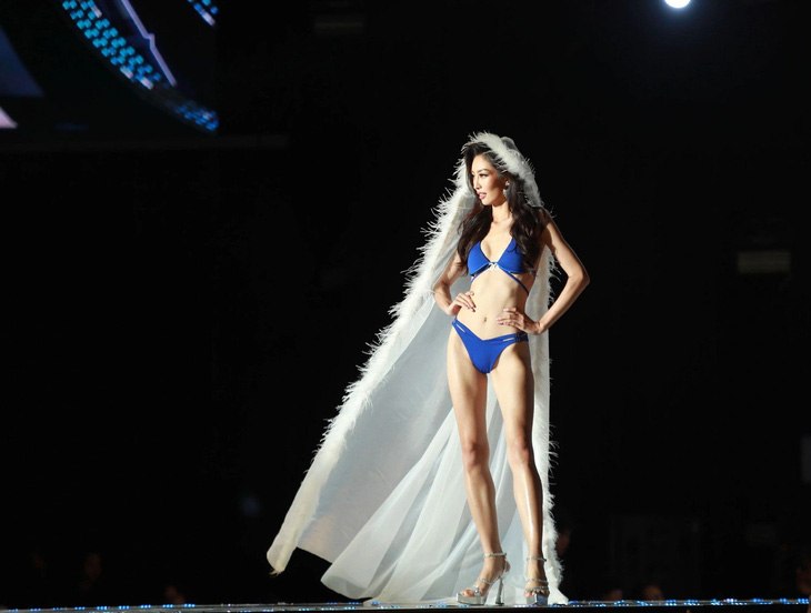 A contestant participates in the swimsuit stage at the grand finale of Miss Cosmo Vietnam 2023 in Da Lat City, Lam Dong Province, Vietnam’s Central Highlands, December 31, 2023. Photo: Mai Vinh / Tuoi Tre