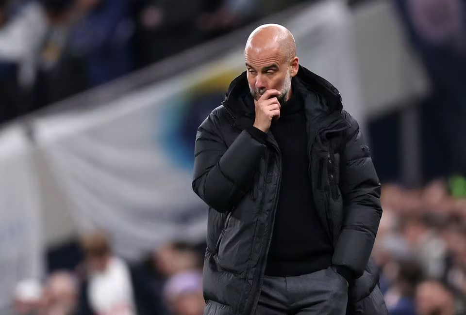 Soccer Football - FA Cup - Fourth Round - Tottenham Hotspur v Manchester City - Tottenham Hotspur Stadium, London, Britain - January 26, 2024 Manchester City manager Pep Guardiola reacts. Photo: Reuters