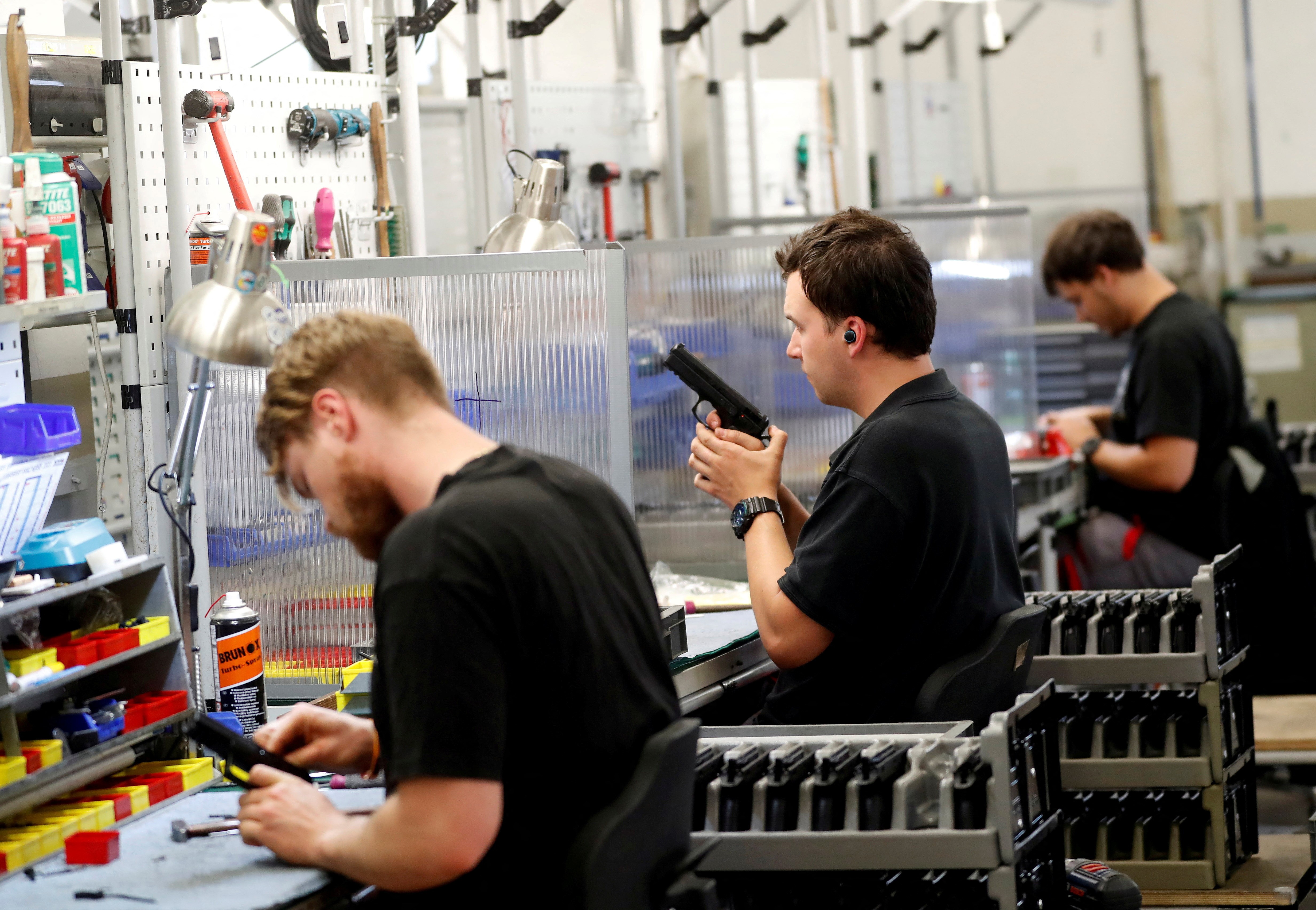 Employees work in the Ceska Zbrojovka small arms factory in Uhersky Brod, Czech Republic, August 31, 2021. Photo: Reuters
