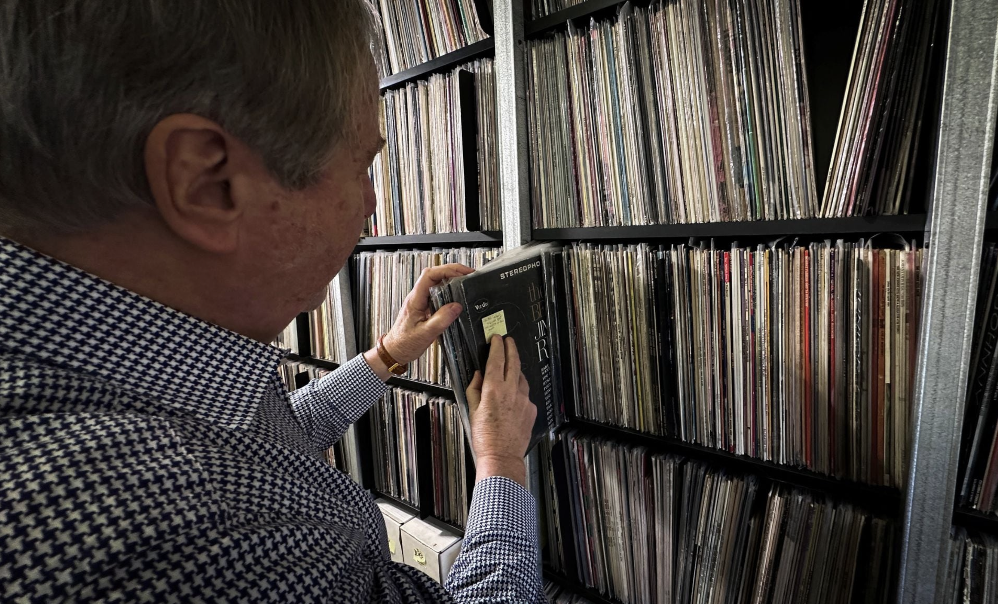 Bob George, Co-Founder and Director of the Archive of Contemporary Music, one of the largest vinyl record collections in the world that is seeking a new home, looks at records during an interview with Reuters in the Archive's present location in Staatsburg, New York, U.S., January 31, 2024. Photo: Reuters