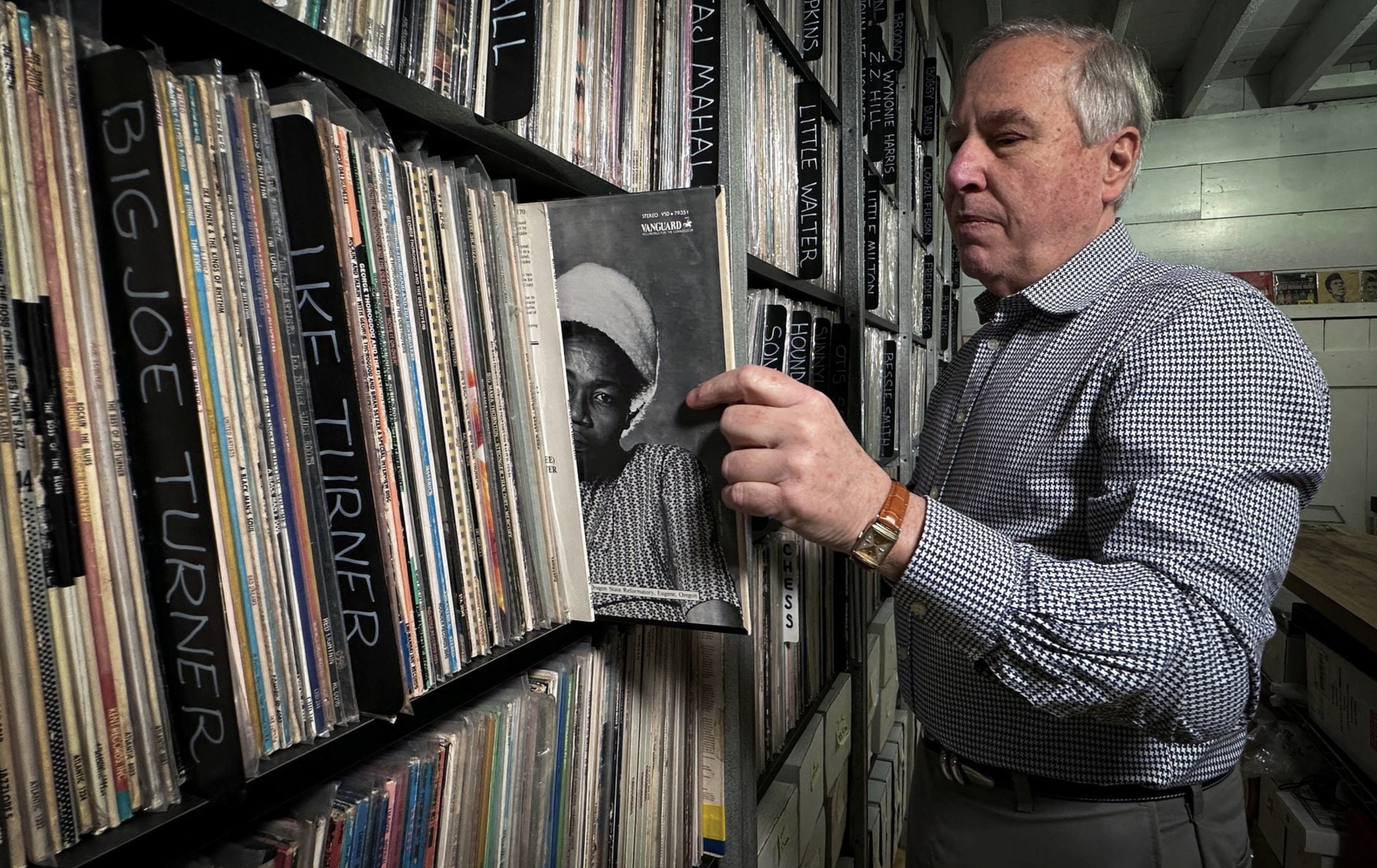 Bob George, Co-Founder and Director of the Archive of Contemporary Music, one of the largest vinyl record collections in the world that is seeking a new home, looks at records during an interview with Reuters in the Archive's present location in Staatsburg, New York, U.S., January 31, 2024. Photo: Reuters