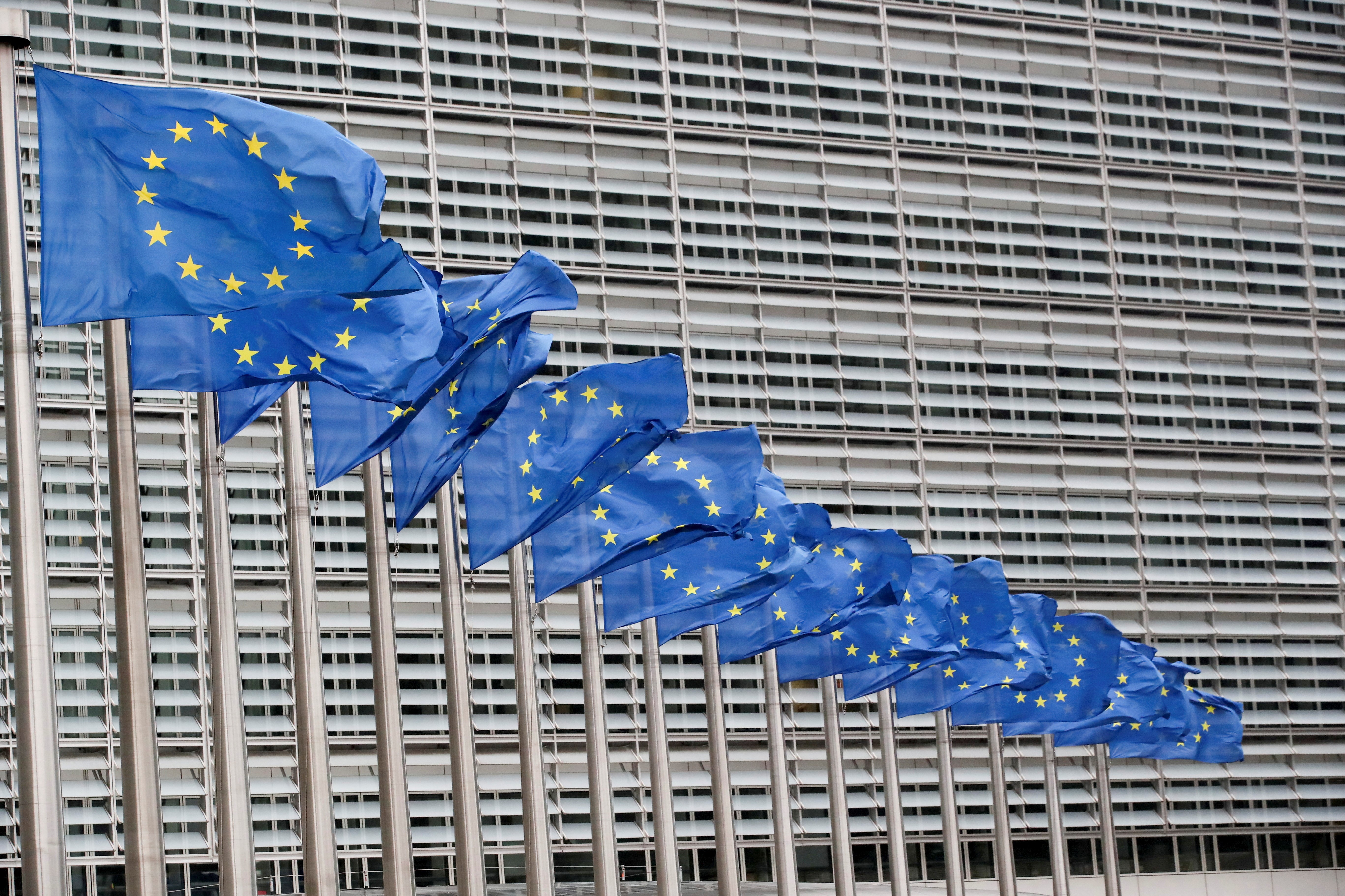 European Union flags flutter outside the EU Commission headquarters in Brussels, Belgium, July 14, 2021. Photo: Reuters