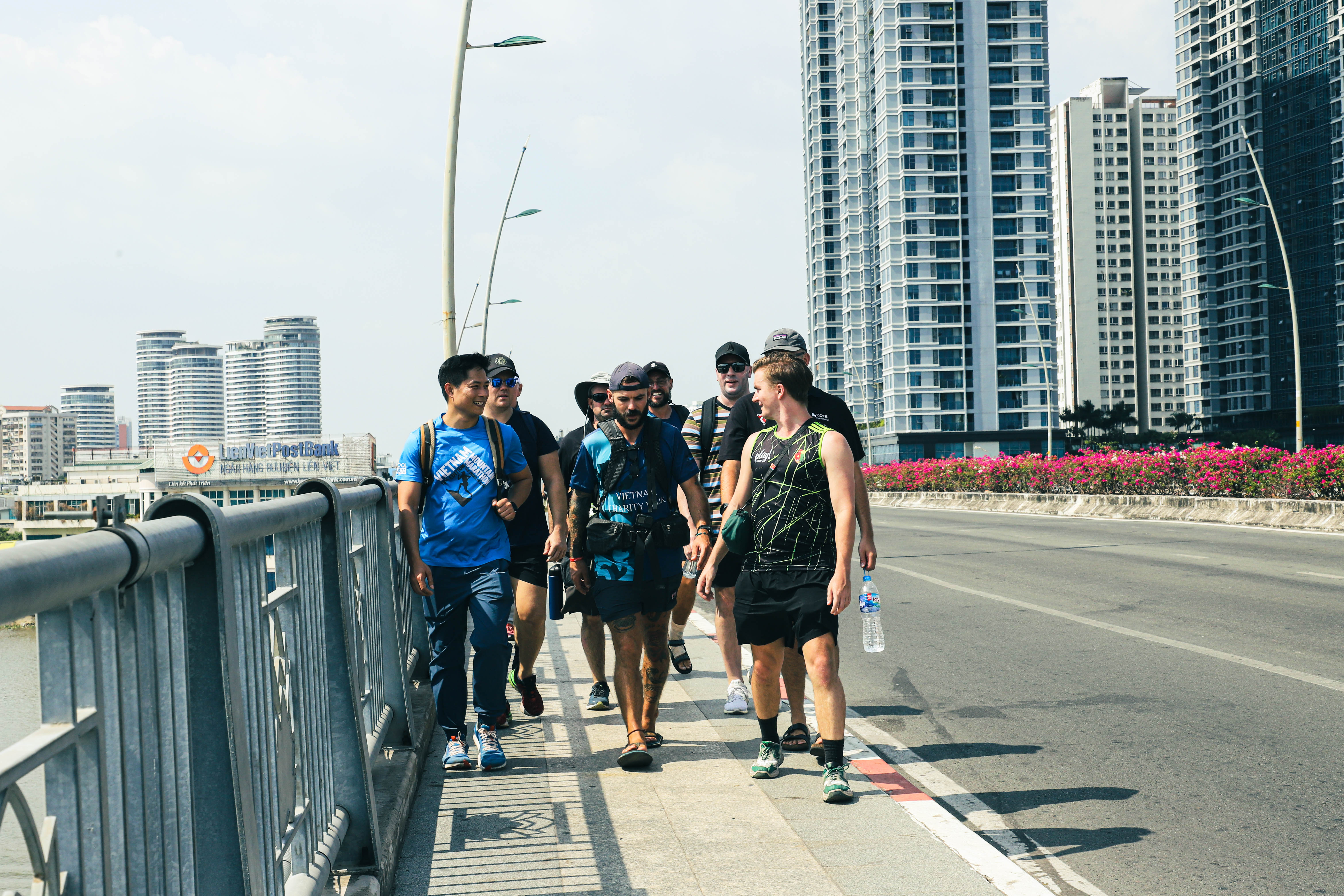 A supplied photo shows Sean Down and Jake Norris being joined by expats in Ho Chi Minh City for their final strecth from the Saigon Opera House in District 1 to Thao Dien in Thu Duc City, Ho Chi Minh City on February 24, 2024. Photo: Duong Van Duoc