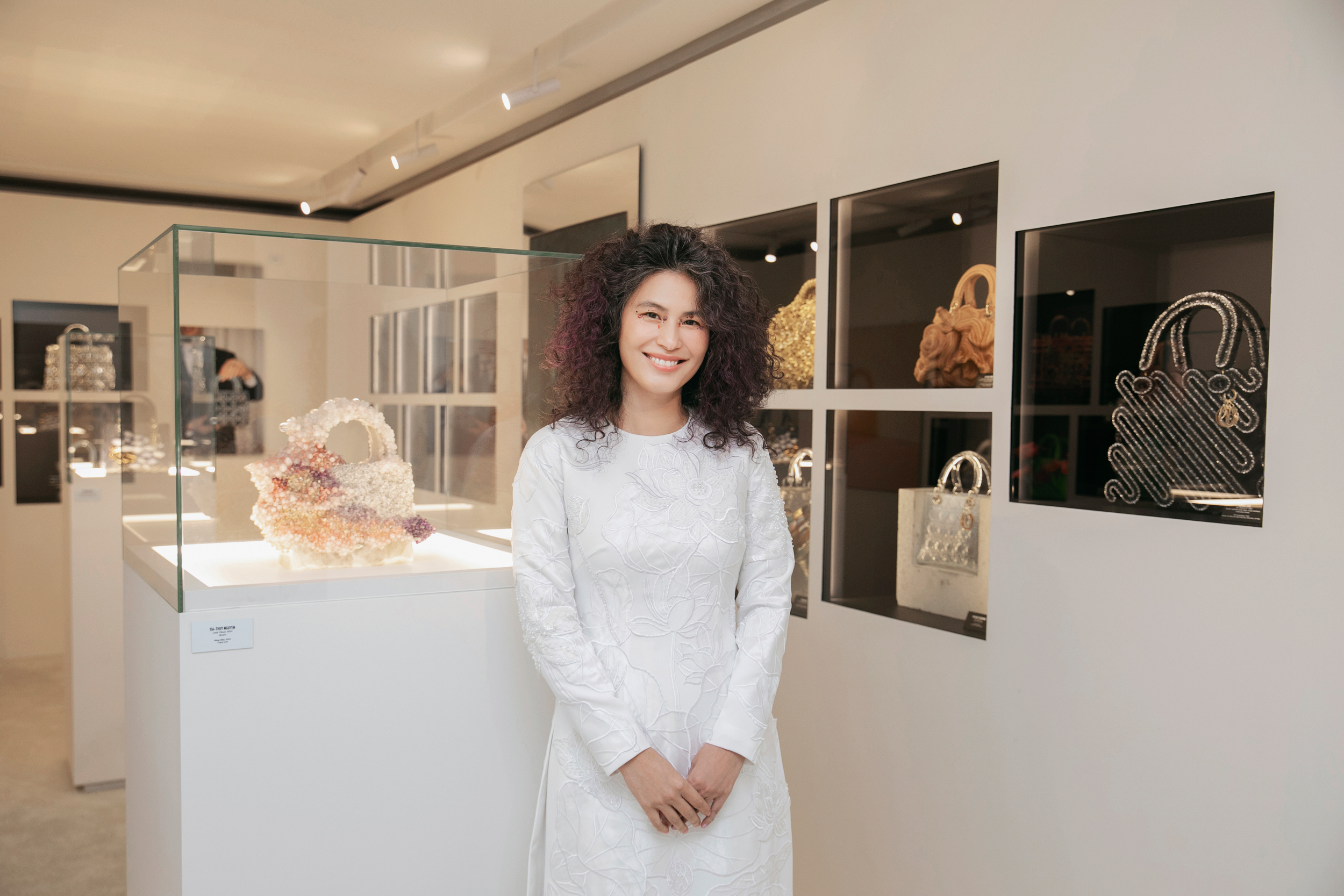 Tia-Thuy Nguyen poses at the Lady Dior As Seen By exhibition. Photo: Supplied