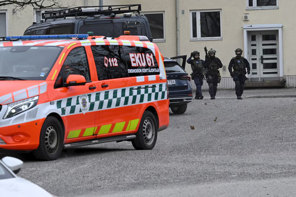 Police officers operate at the Viertola comprehensive school in Vantaa, Finland, on April 2, 2024. Three minors were injured in a shooting at the school on Tuesday morning. A suspect, also a minor, has been apprehended. Lehtikuva/Markku Ulander via Reuters