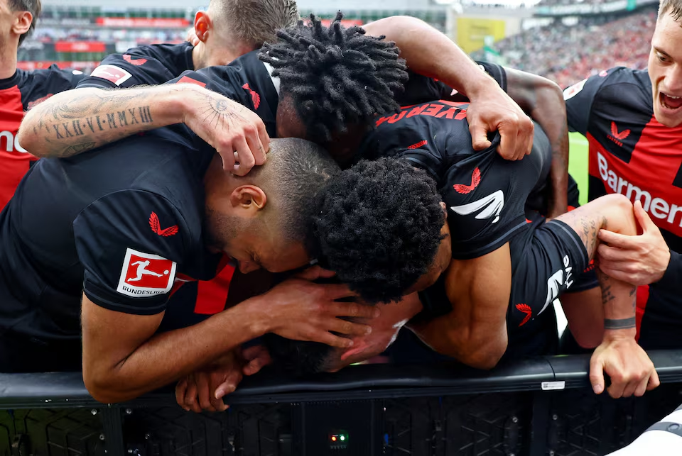Soccer Football - Bundesliga - Bayer Leverkusen v Werder Bremen - BayArena, Leverkusen, Germany - April 14, 2024 Bayer Leverkusen's Granit Xhaka celebrates scoring their second goal with teammates. Photo: Reuters
