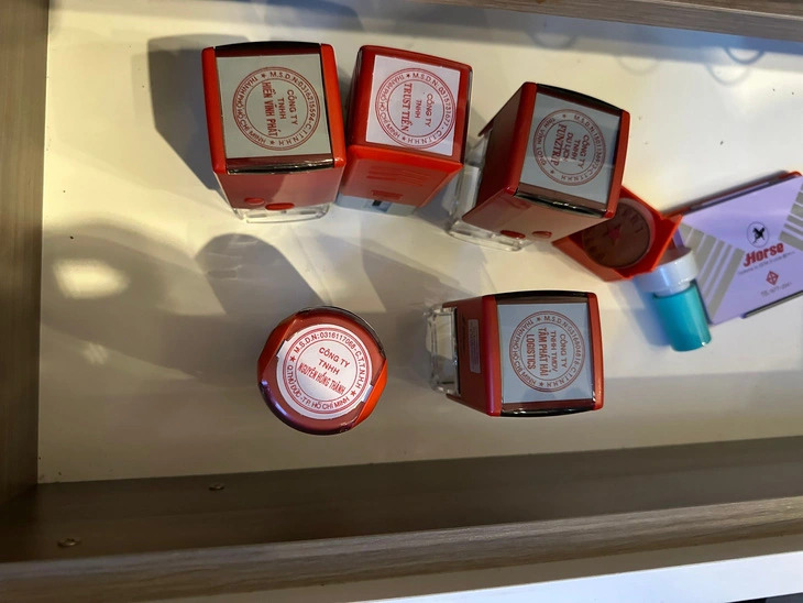 A photo of seals for several fake firms run by the loan shark ring. Photo: Quang Nam Police