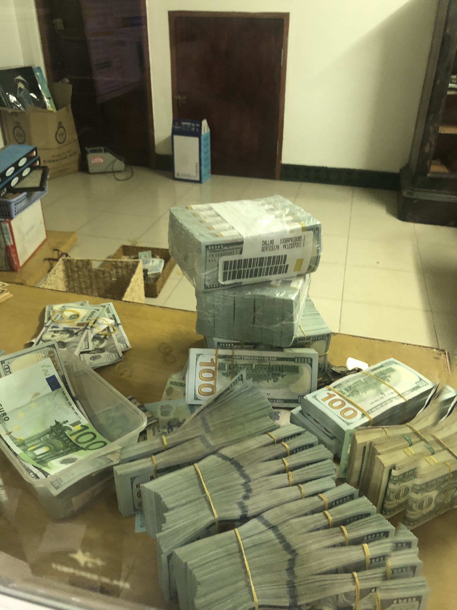 Stacks of foreign currency cash amounts are seized in the case. Photo: Supplied