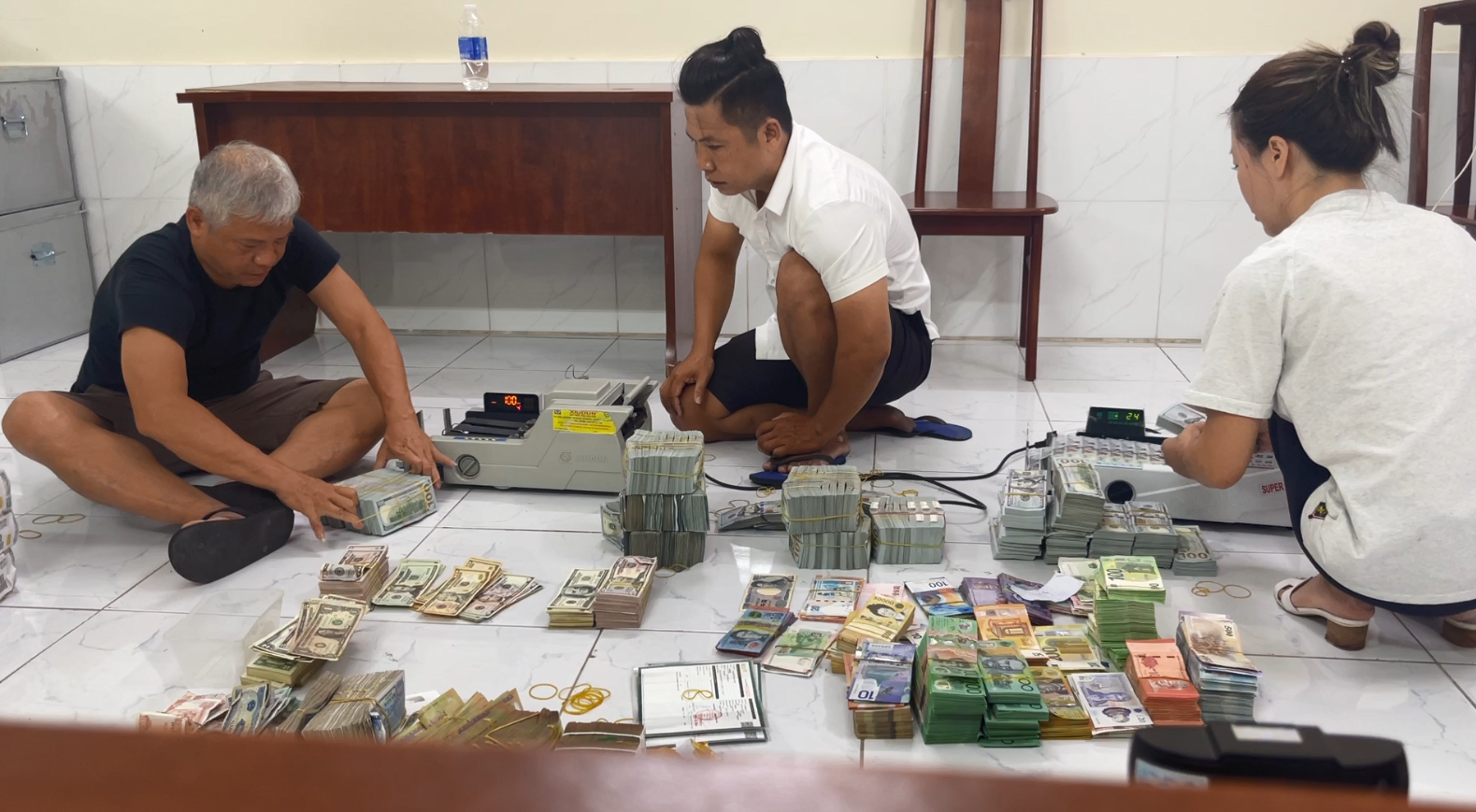 Stacks of foreign currency cash amounts are seized in the case. Photo: Supplied