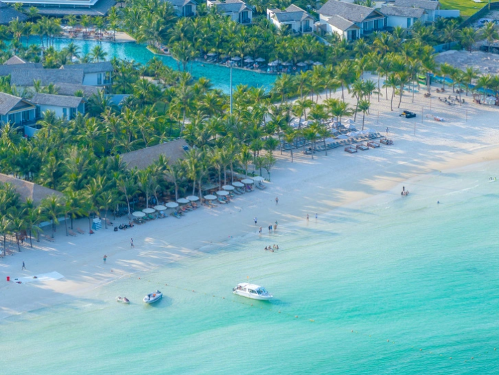 Gorgeous sand and magnificent sunlight bring tourists to the beach.