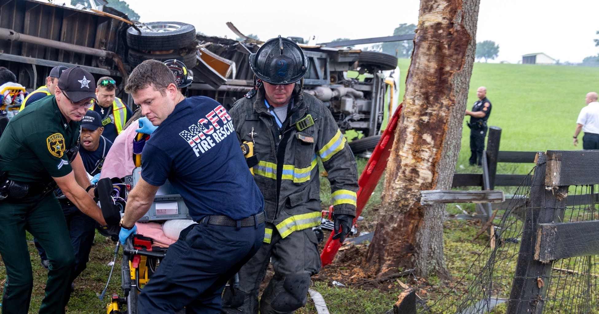Fire rescue unit workers attend the scene after a bus carrying laborers to a melon farm overturned in a fatal crash near Dunnellon, Marion County, Florida, U.S. in this handout picture released on May 14, 2024. Photo: Reuters