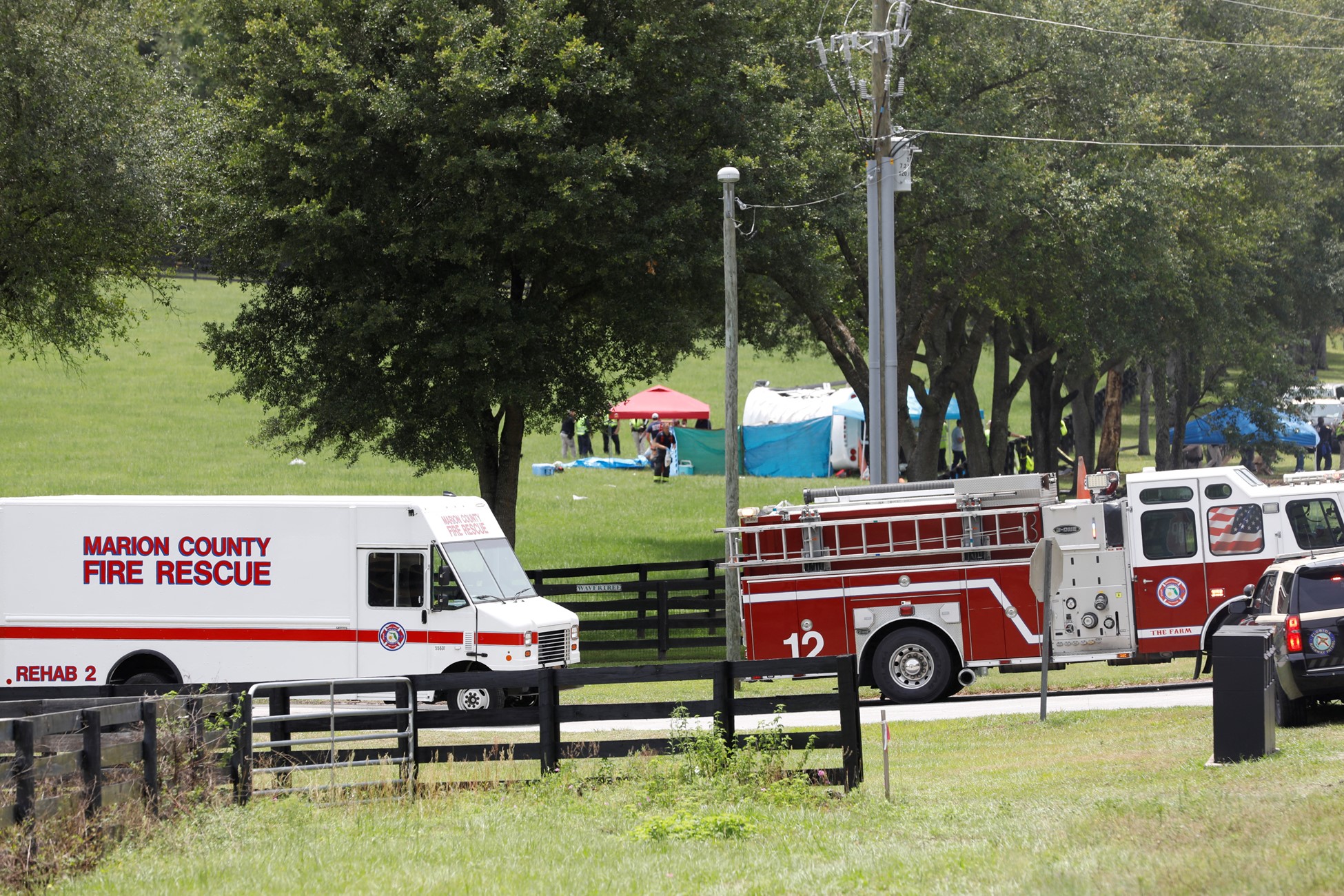 Marion County Fire Rescuers work on the scene where a bus, carrying laborers to a melon farm, overturned in a fatal crash near Dunnellon, Florida, U.S. May 14, 2024. Photo: Reuters