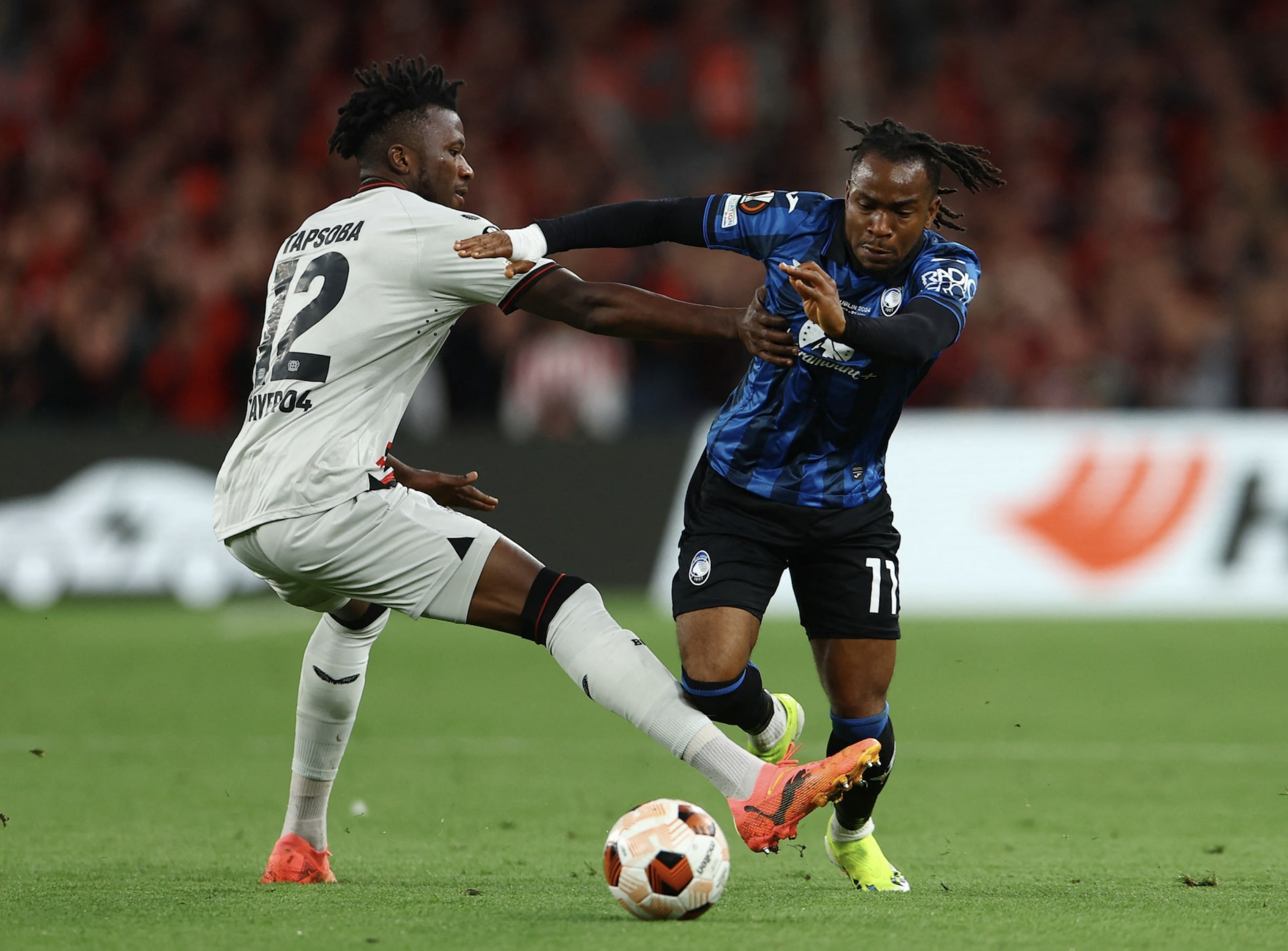 Soccer Football - Europa League - Final - Atalanta v Bayer Leverkusen - Aviva Stadium, Dublin, Ireland - May 22, 2024 Bayer Leverkusen's Edmond Tapsoba in action with Atalanta's Ademola Lookman. Photo: Reuters
