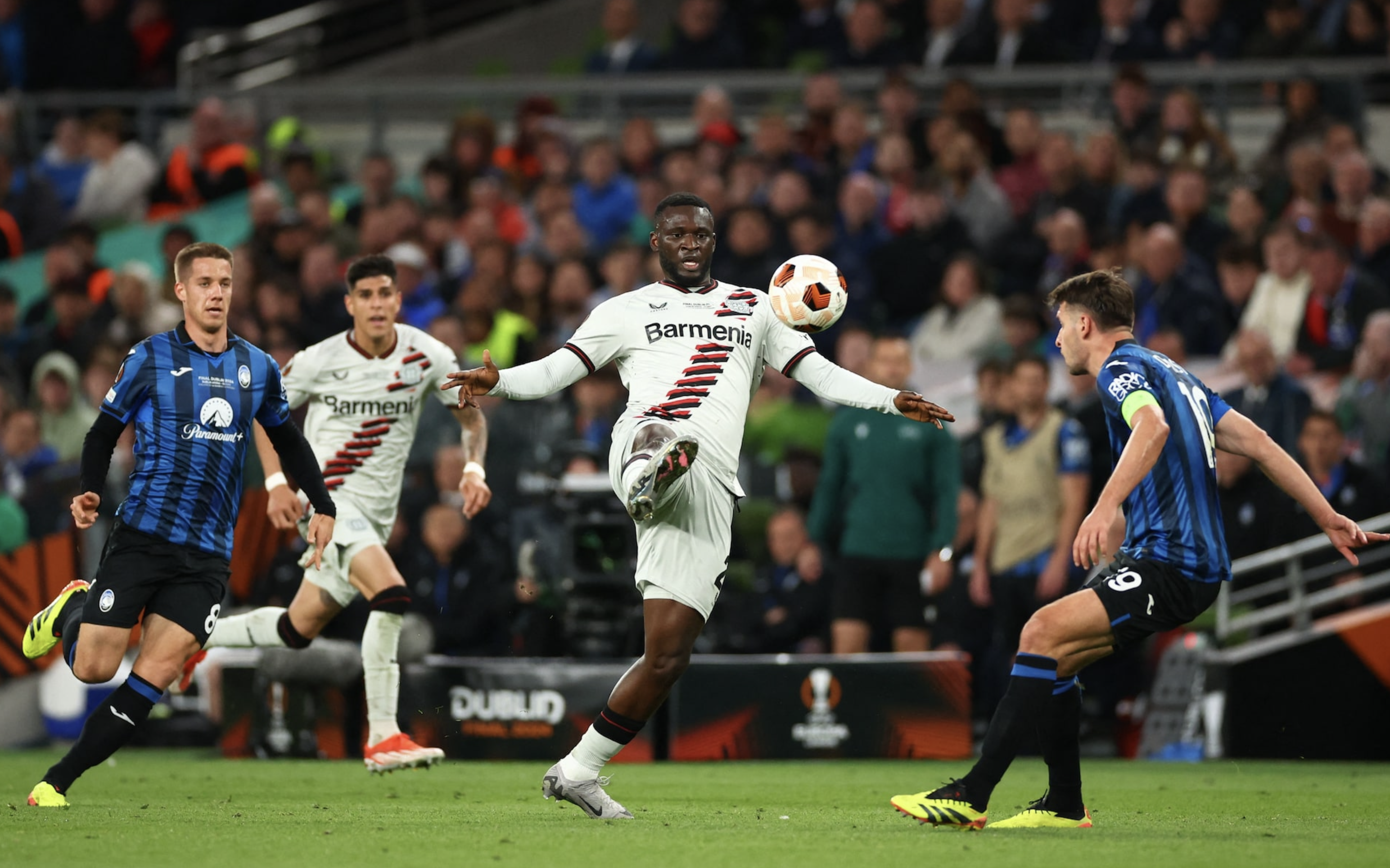 Soccer Football - Europa League - Final - Atalanta v Bayer Leverkusen - Aviva Stadium, Dublin, Ireland - May 22, 2024 Bayer Leverkusen's Victor Boniface in action with Atalanta's Berat Djimsiti. Photo: Reuters