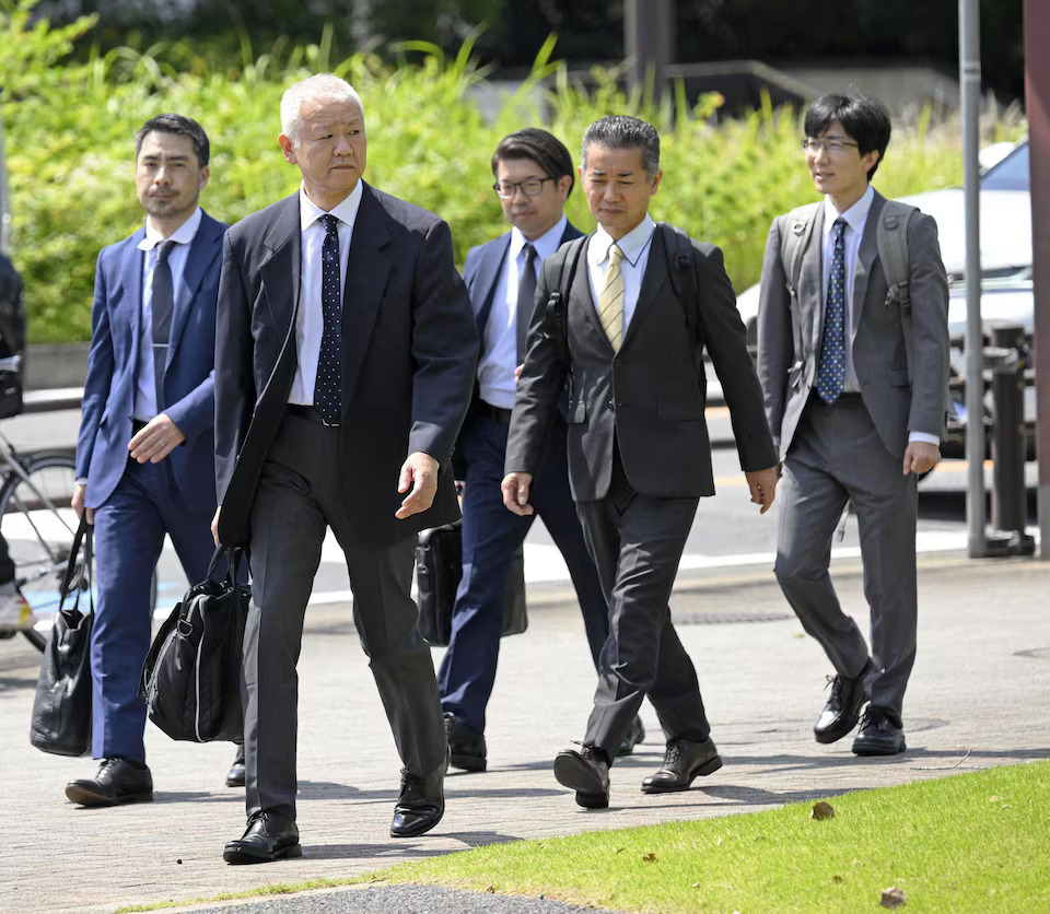 Japanese transport ministry officials head to Toyota Motor Corp.'s headquarters for an on-site investigation over certification irregularities in central Japan, June 4, 2024, in this photo taken by Kyodo. Photo: Reuters