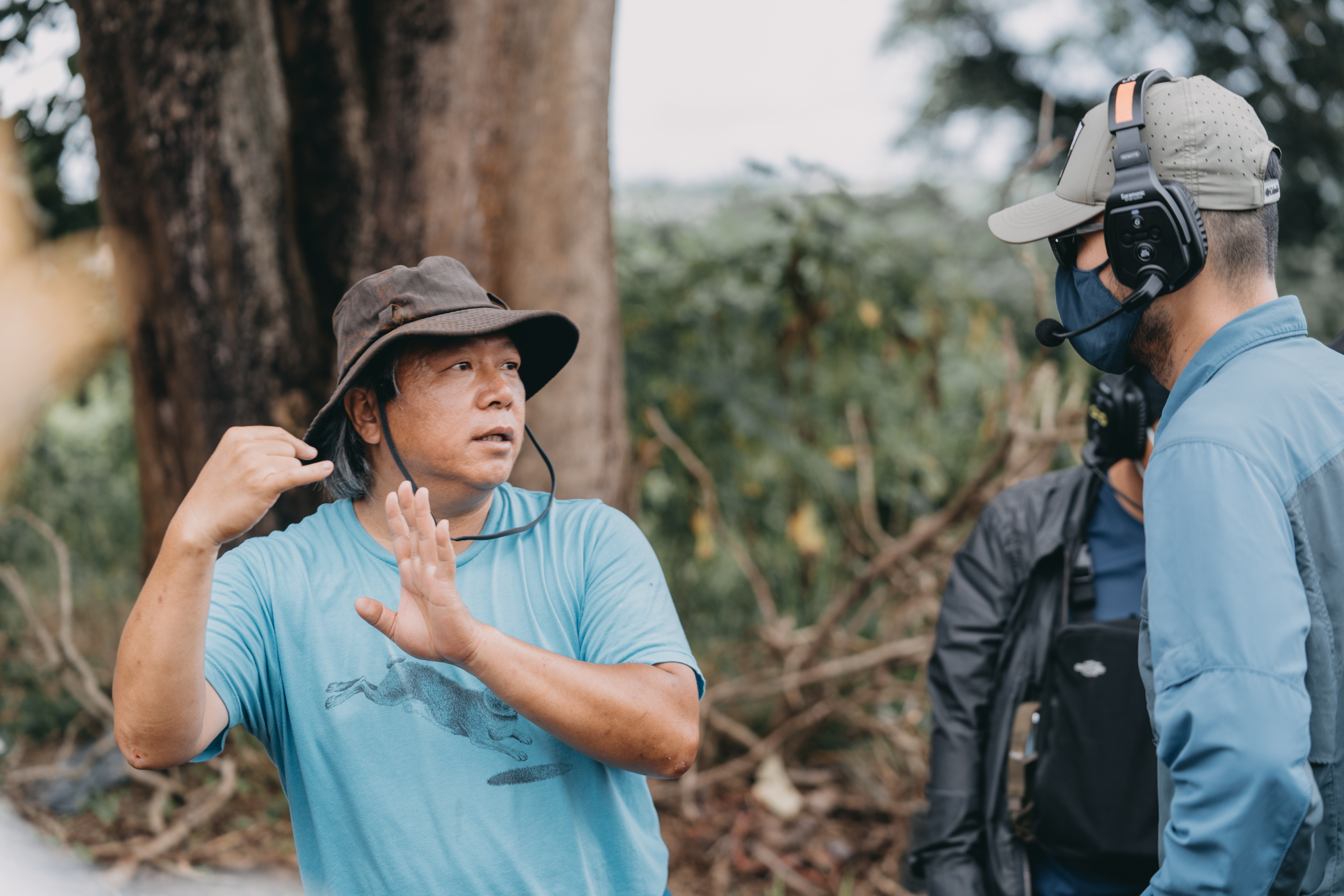 A behind-the-scenes image of film director Ham Tran