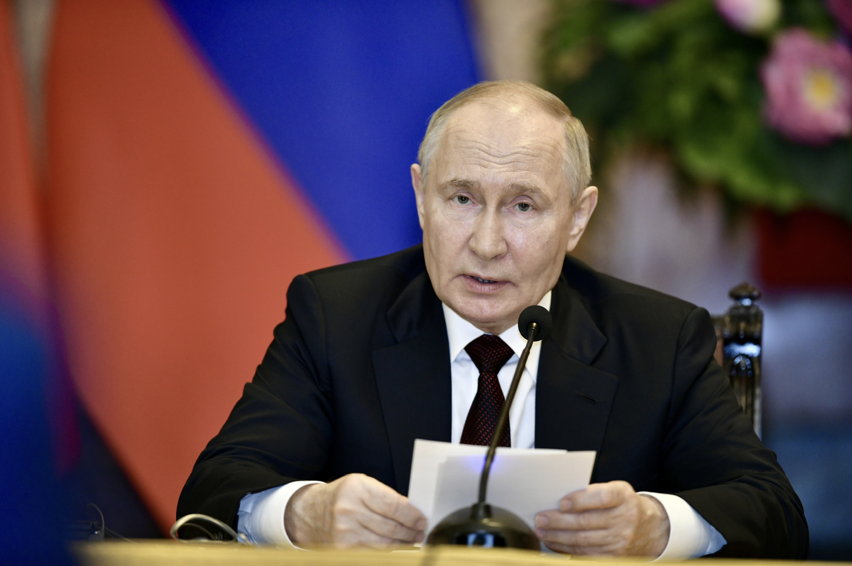 Russia’s President Vladimir Putin delivers his speech at a press briefing on June 20, 2024. Photo: Nam Tran / Tuoi Tre