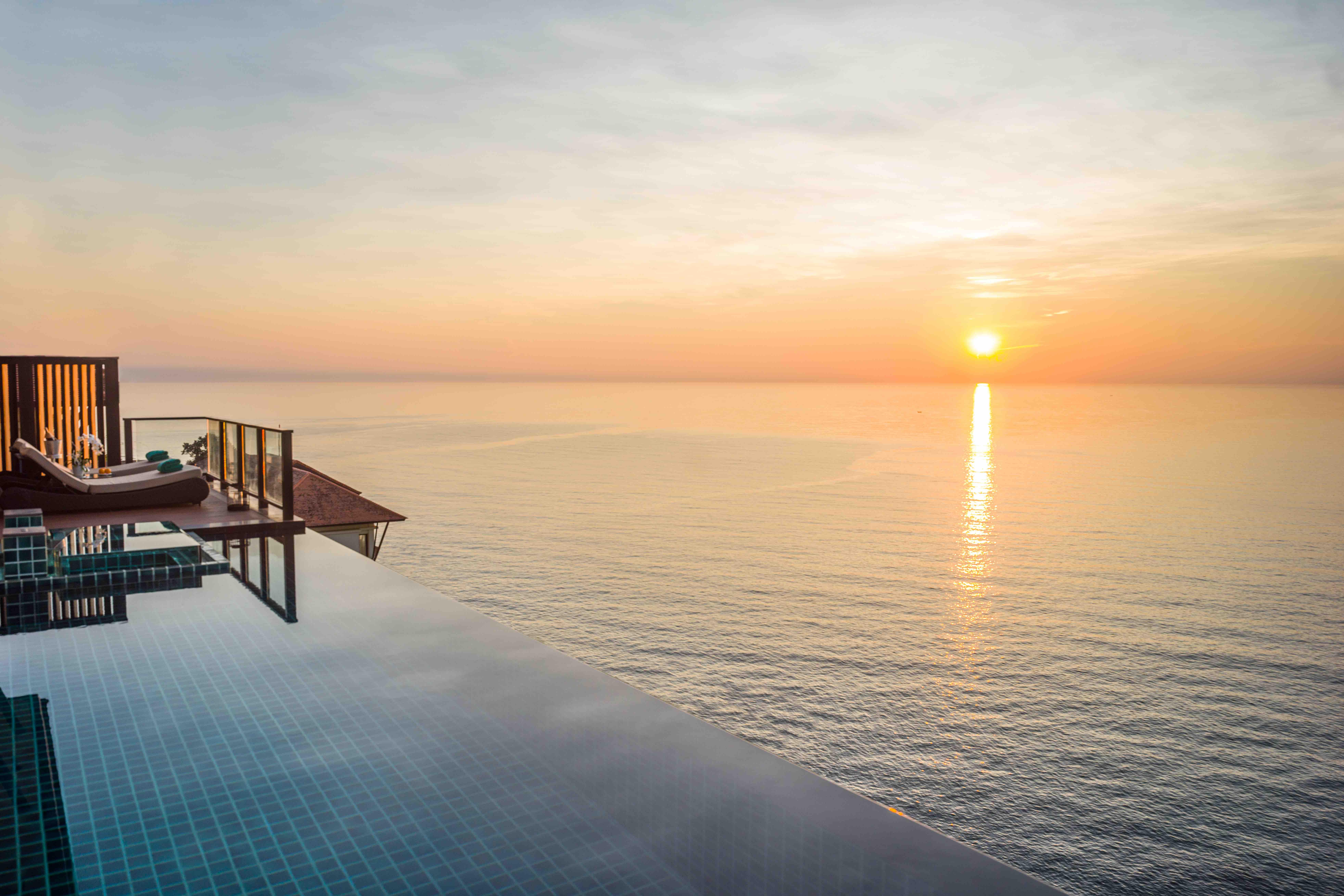 Sunrise from the three-bedroom Oceanview Hillside Pool Villa