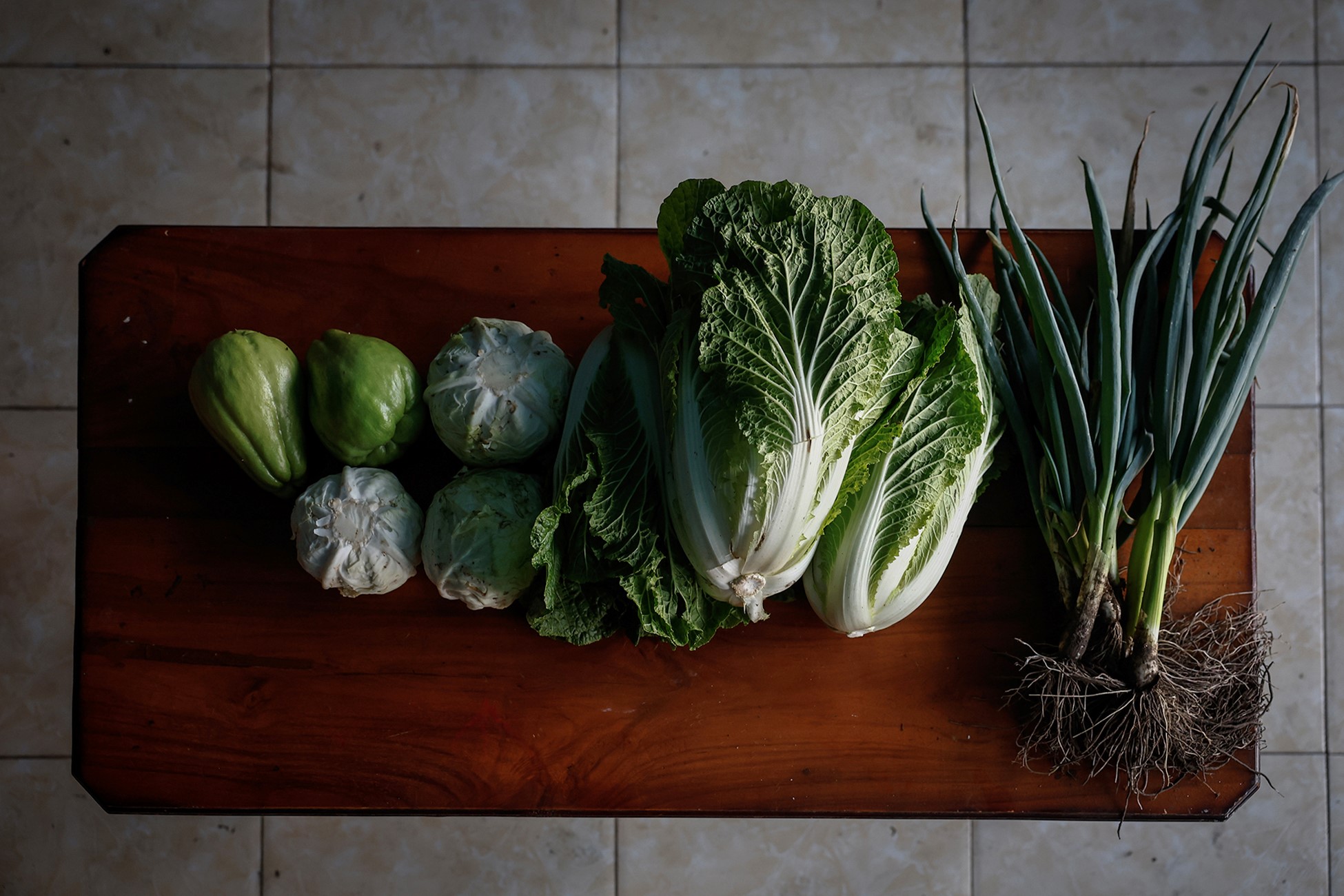 Vegetables belonging to Asih are displayed on a table before preparing them as offerings, ahead of the Yadnya Kasada festival in  Ngadirejo village, East Java, Indonesia, June 20, 2024. Photo: Reuters