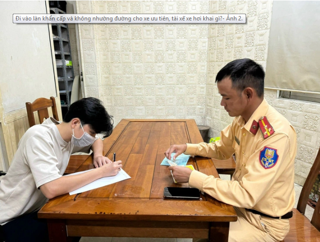 The car driver (L) at the police station. Photo: Supplied
