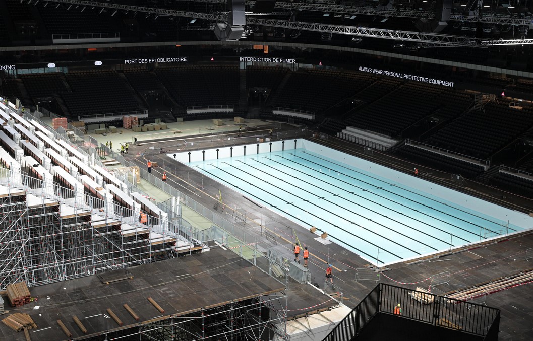  The temporary pool used for the swimming is set to be dug out and moved elsewhere. Photo: AFP 