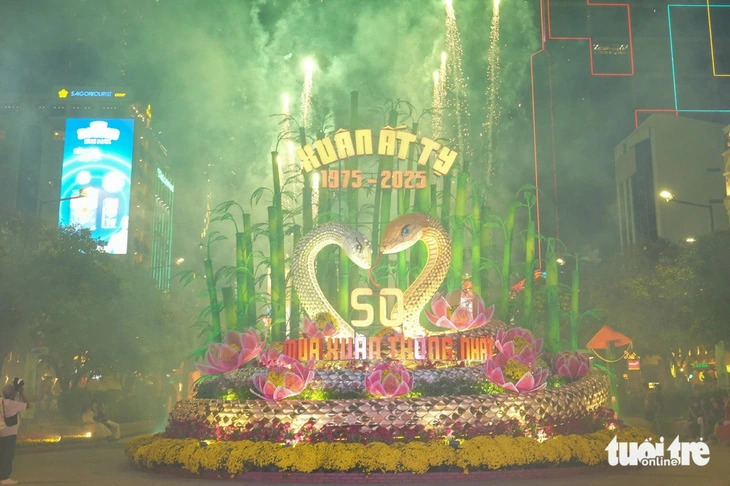A firework display at the entrance gate of Nguyen Hue Flower Street 2025 in District 1, Ho Chi Minh City, southern Vietnam, on January 27, 2025.