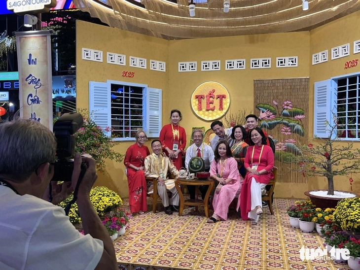 People enjoy Tet atmosphere at Nguyen Hue Flower Street 2025, which opened in District 1, Ho Chi Minh City, on January 27, 2025.