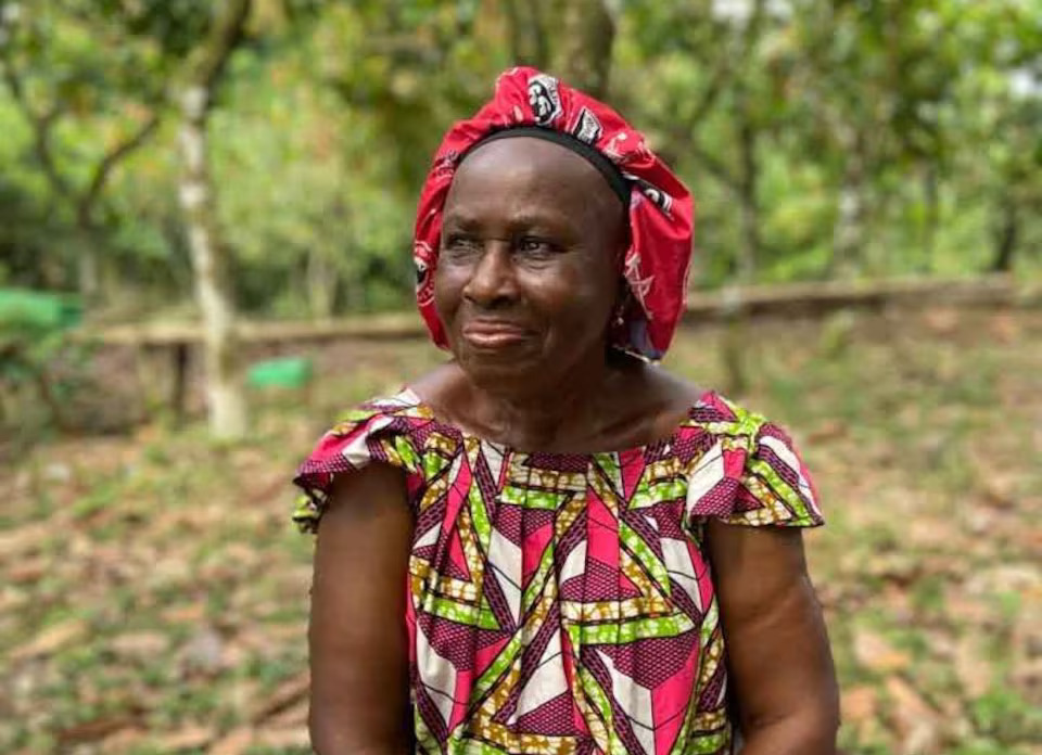 Monique N’Guessan Amlan, a cocoa farmer in Ivory Coast, who was supported to adopt climate-resilient practices by the Green Climate fund. Photo: Reuters