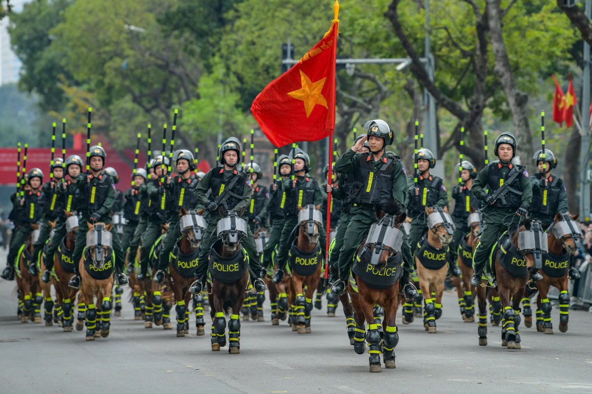 Cavalry troops parade on a local street in Hanoi, as part of the ‘Glory to Vietnam’s People's Public Security’ program held by the Ministry of Public Security in Hanoi on March 8, 2025.