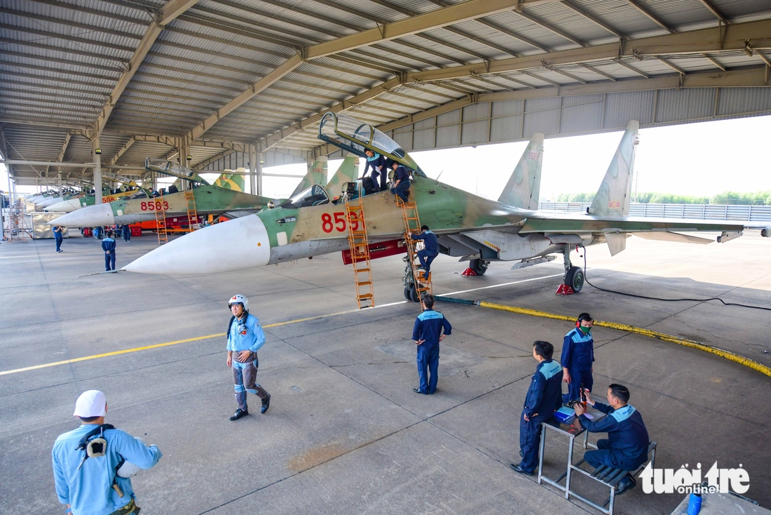 Seven Su-30MK2 fighter jets are stationed at Bien Hoa Airbase in Dong Nai Province, southern Vietnam, during a rehearsal in preparation for their involvement in a military parade scheduled for April 30, 2025 in Ho Chi Minh City to celebrate Vietnam’s Reunification Day. Photo: Quang Dinh / Tuoi Tre