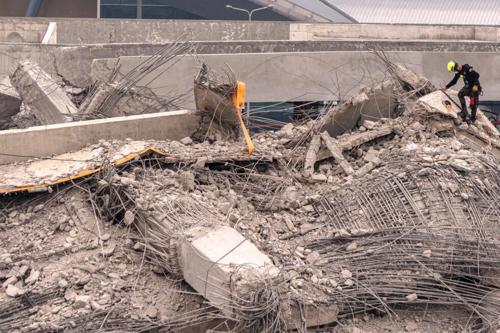 Testing of steel bars from the site has found that some of the metal used was substandard. Photo: AFP