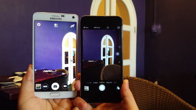 Galaxy và iPhone, Samsung và Apple, cuộc giằng co quyết liệt hơn trong năm 2015 - Ảnh: T.Trực