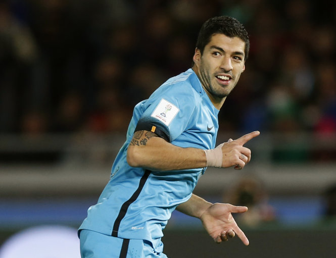 Luis Suarez ăn mừng bàn thắng vào lưới Guangzhou Evergrande. Ảnh: Reuters