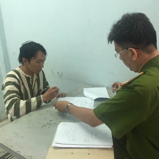 Nghi can Vĩnh tại cơ quan cảnh sát điều tra công an Q.Gò Vấp - Ảnh: Mỹ Thương